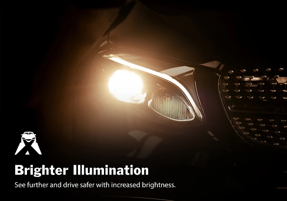Bright car headlight shining in a dark setting with the text "Brighter Illumination – See further and drive safer with increased brightness."